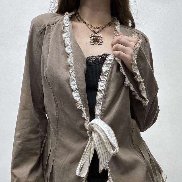 Brown pinstripe bow shirt