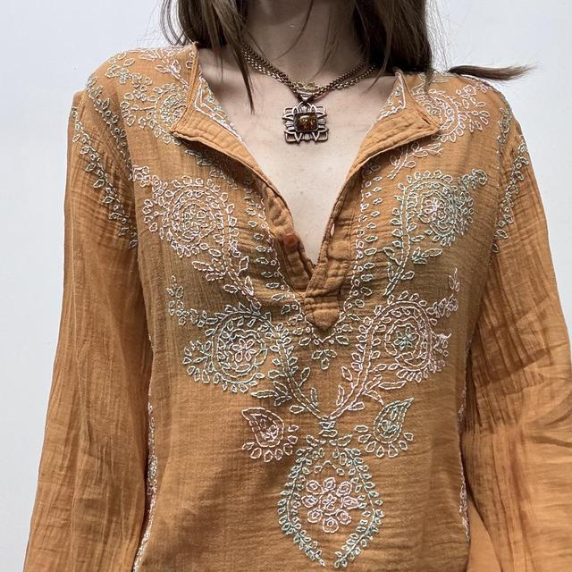 Orange cotton embroidered flared shirt