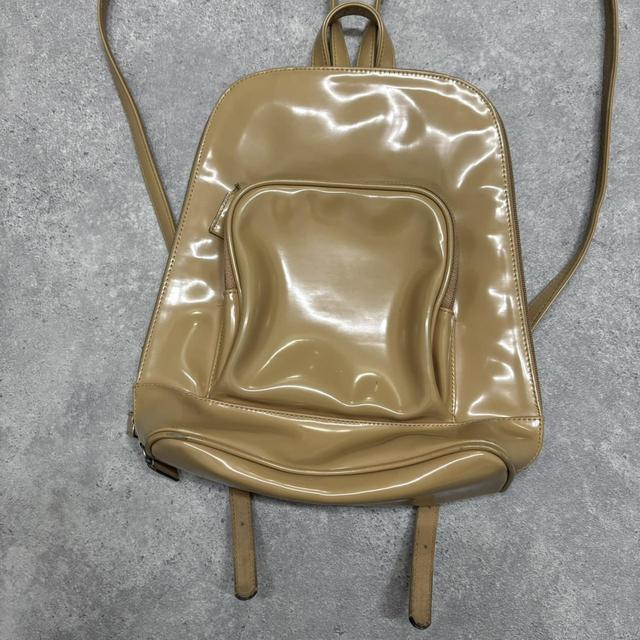 Tan paintent PVC backpack