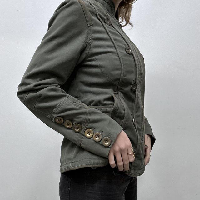 Green metal button stud jacket