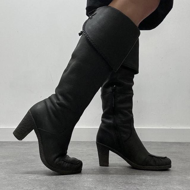 Black square toe leather boots