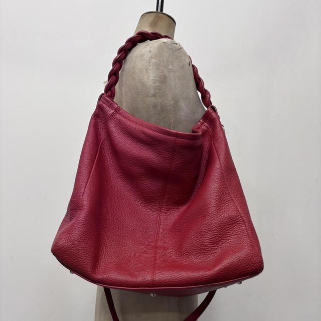 Red leather slouchy woven bag