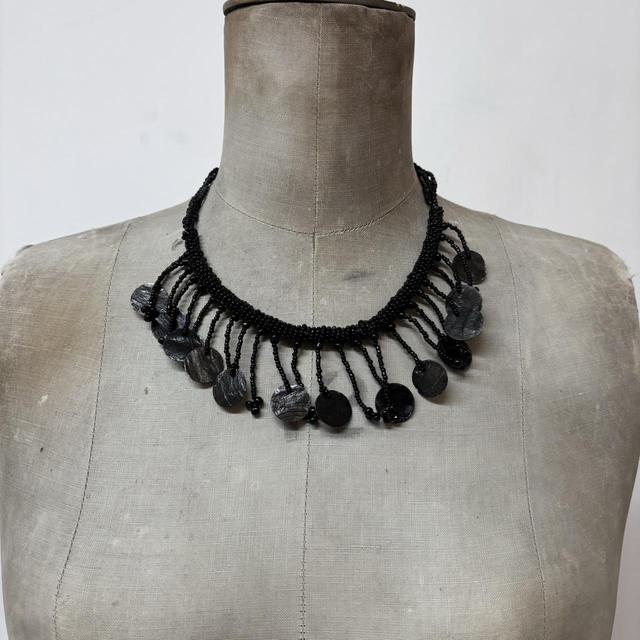 Black beaded drape