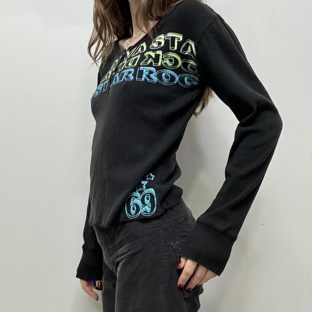 Black ribbed graphic print top