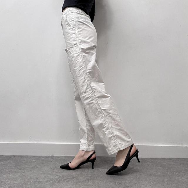 White flared armari trousers