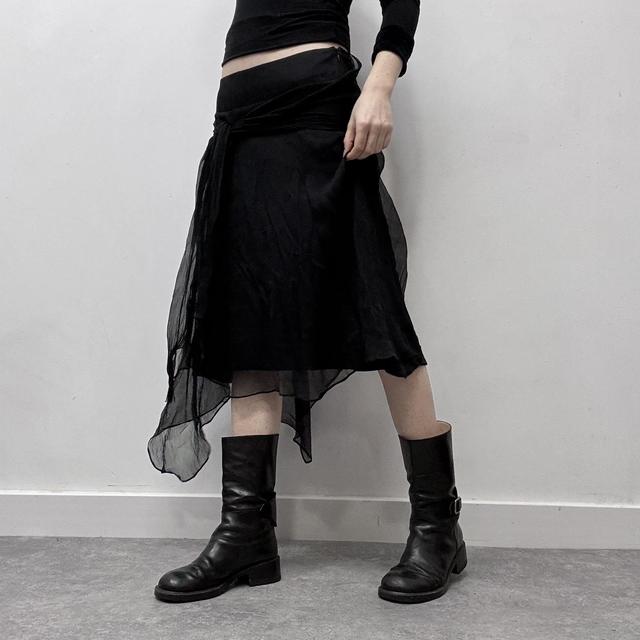 Sheer black asymmetric flutter skirt