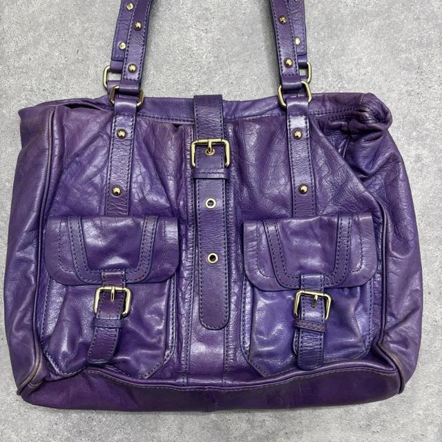 Purple leather city bag