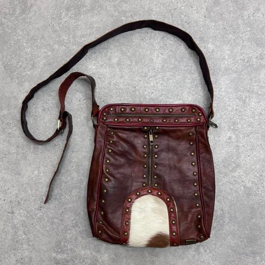 Cow hide studded brown leather bag