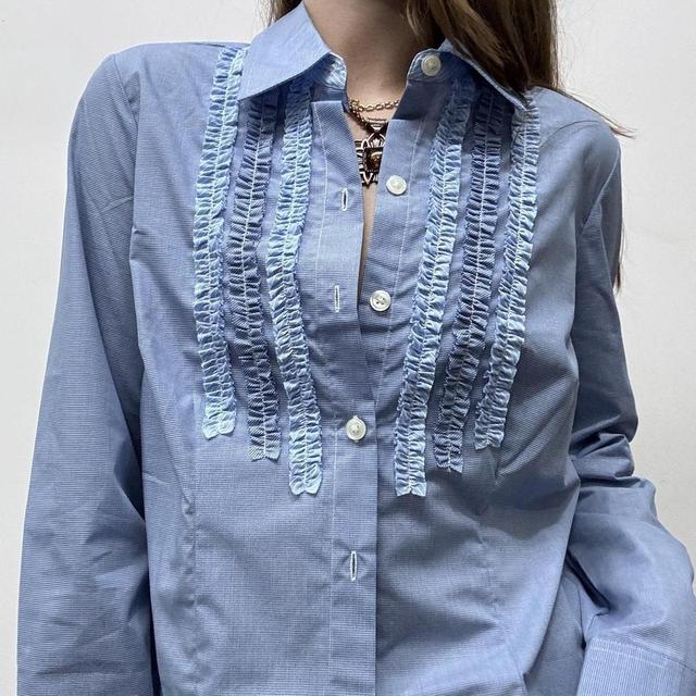 Blue pinstripe ruffle shirt