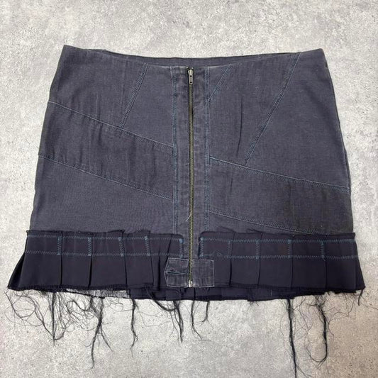 Distressed grunge pleated denim mini skirt