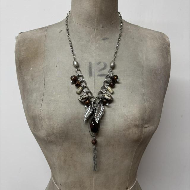 Silver drape charm necklace