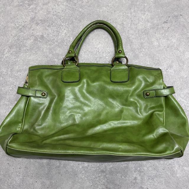 Green slouchy leather charm bag