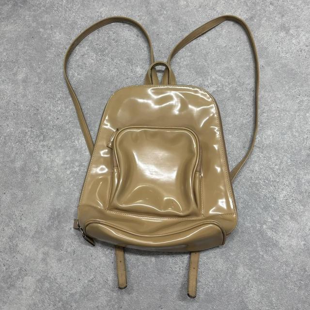 Tan paintent PVC backpack