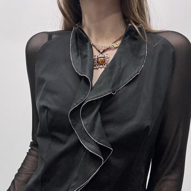 Black ruffle flared shirt