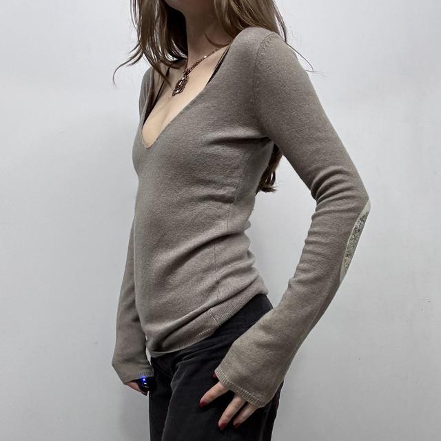 Brown slouchy wool jumper graphic back detail