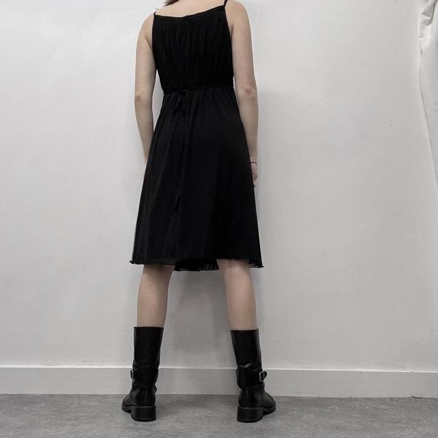 Black pleated cinched mini dress