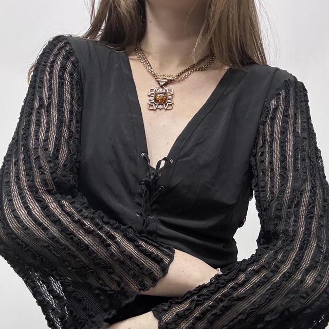 Sheer lace ribbed flared corset top
