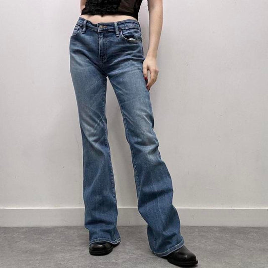 Flared distressed denim jeans