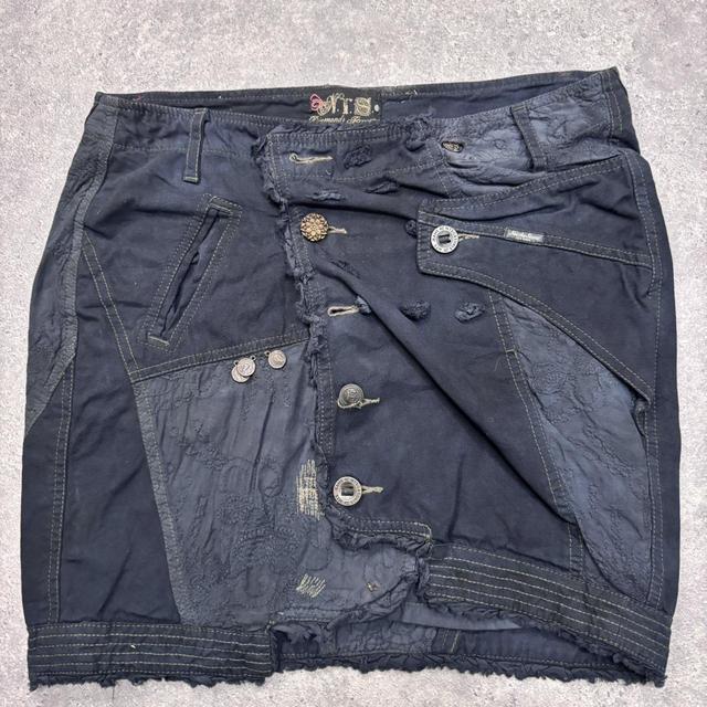 Distressed patchwork asymmetric skirt