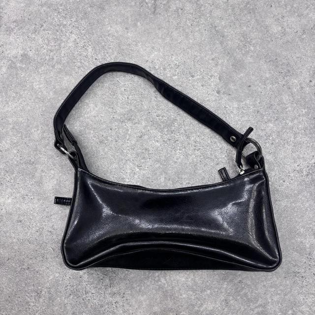 Structured black leather shoulder bag