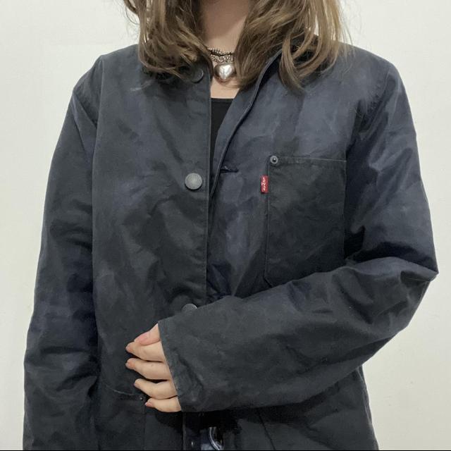 Distressed waxed cotton workwear jacket