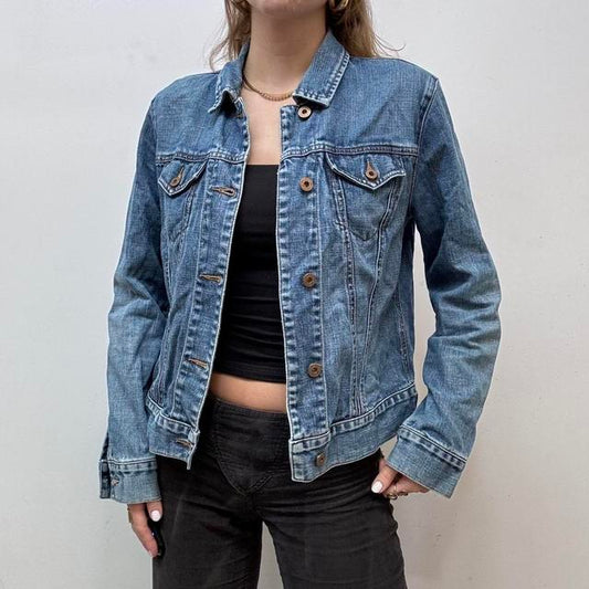 Distressed denim jacket