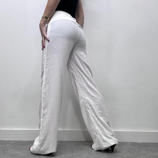 White minimalist flared wide leg trousers