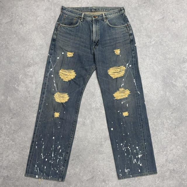 Distressed painted washed jeans