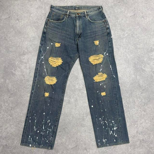Distressed painted washed jeans