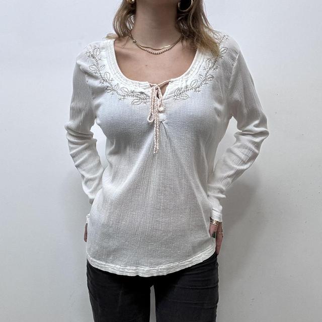White embroidered flared cheesecloth shirt