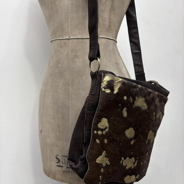 Cow hide abstract gold bag
