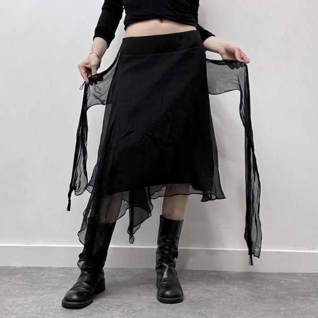 Sheer black asymmetric flutter skirt