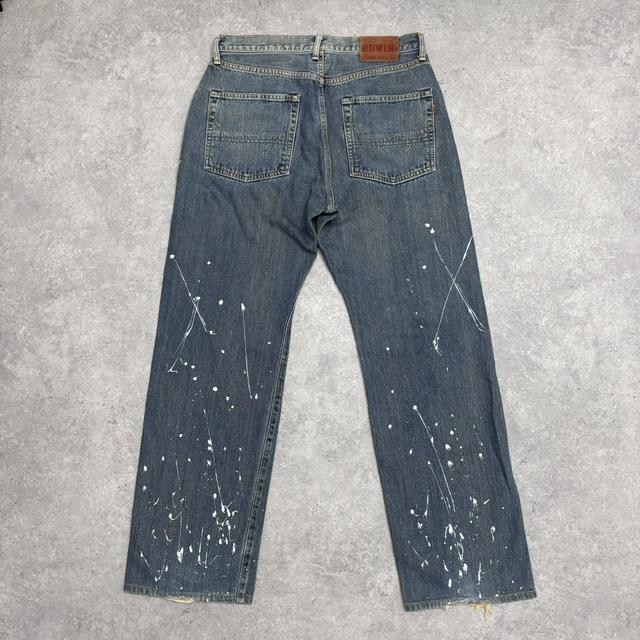 Distressed painted washed jeans
