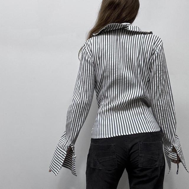 White pinstripe wrap ruffle shirt