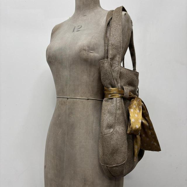 Brown bow shoulder bag