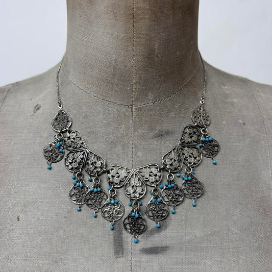 Silver boho wire flower necklace