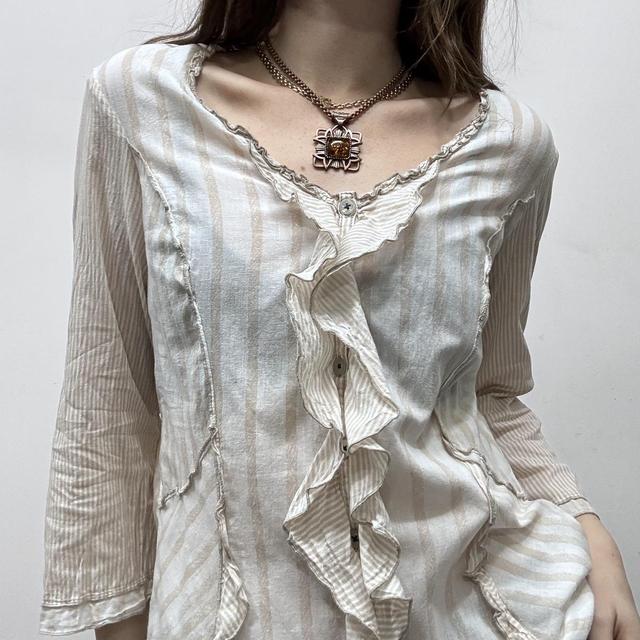 Pinstripe ruffle flared shirt