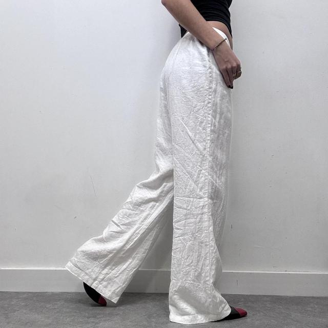 White linen flared wide leg trousers
