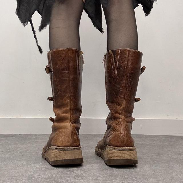 Tan leather heeled toggle boots