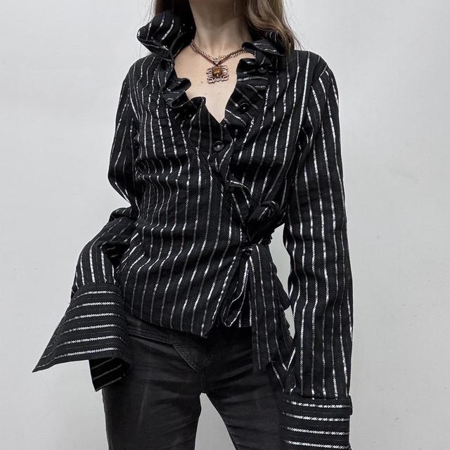 Black pinstripe wrap ruffle shirt