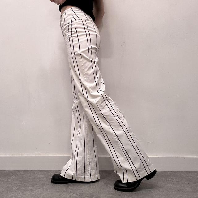 White pinstripe flared suit pants