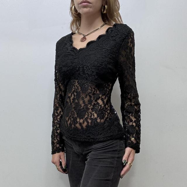 Sheer black lace flared top
