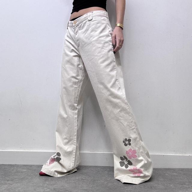 Flared beige wide leg printed trousers