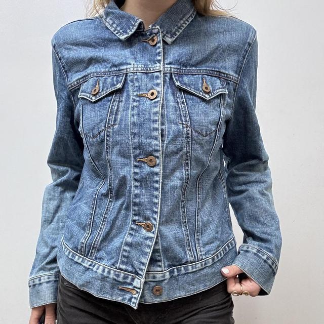 Distressed denim jacket