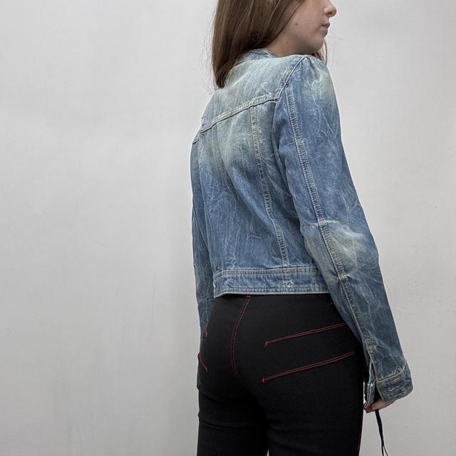 Distressed cropped denim jacket