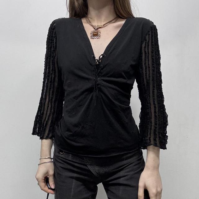 Sheer lace ribbed flared corset top