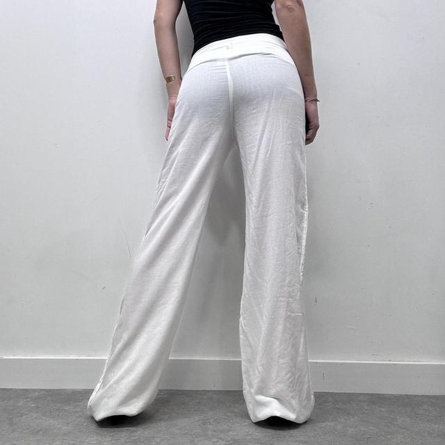 White minimalist flared wide leg trousers