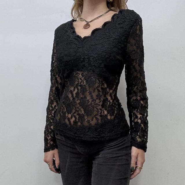 Sheer black lace flared top