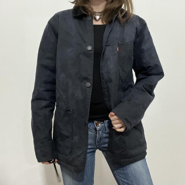Distressed waxed cotton workwear jacket