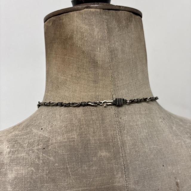 Ornate silver gemstone necklace